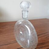 Clear bubble glass bottle molded for easy manual gripping