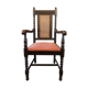Fauteuil en bois sculpté et cannage