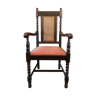 Carved wooden armchair and cannage
