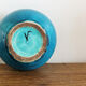 Glazed terracotta onion vase, signed