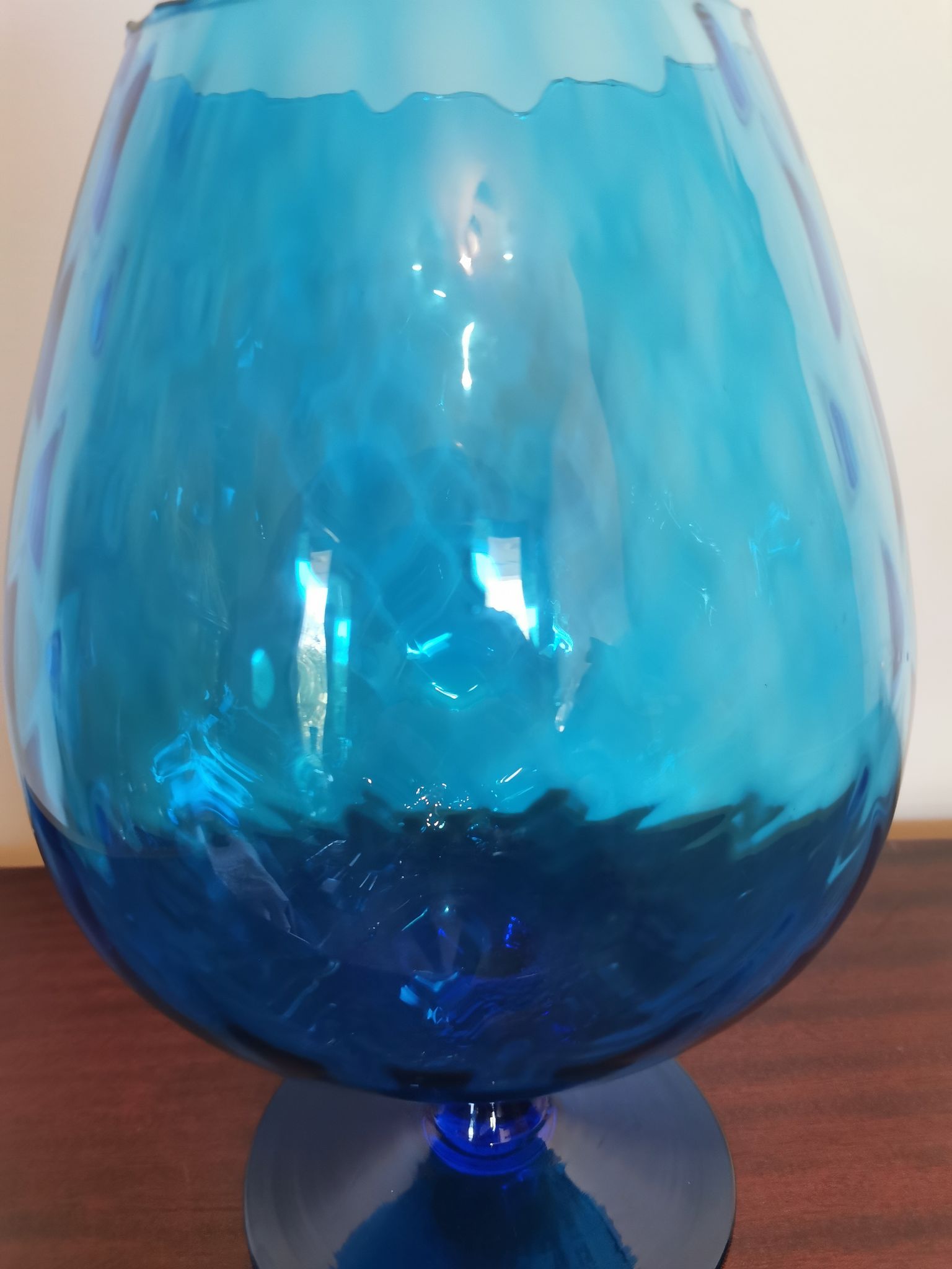 Vintage vase in light blue glass.