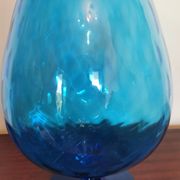 Vintage vase in light blue glass.
