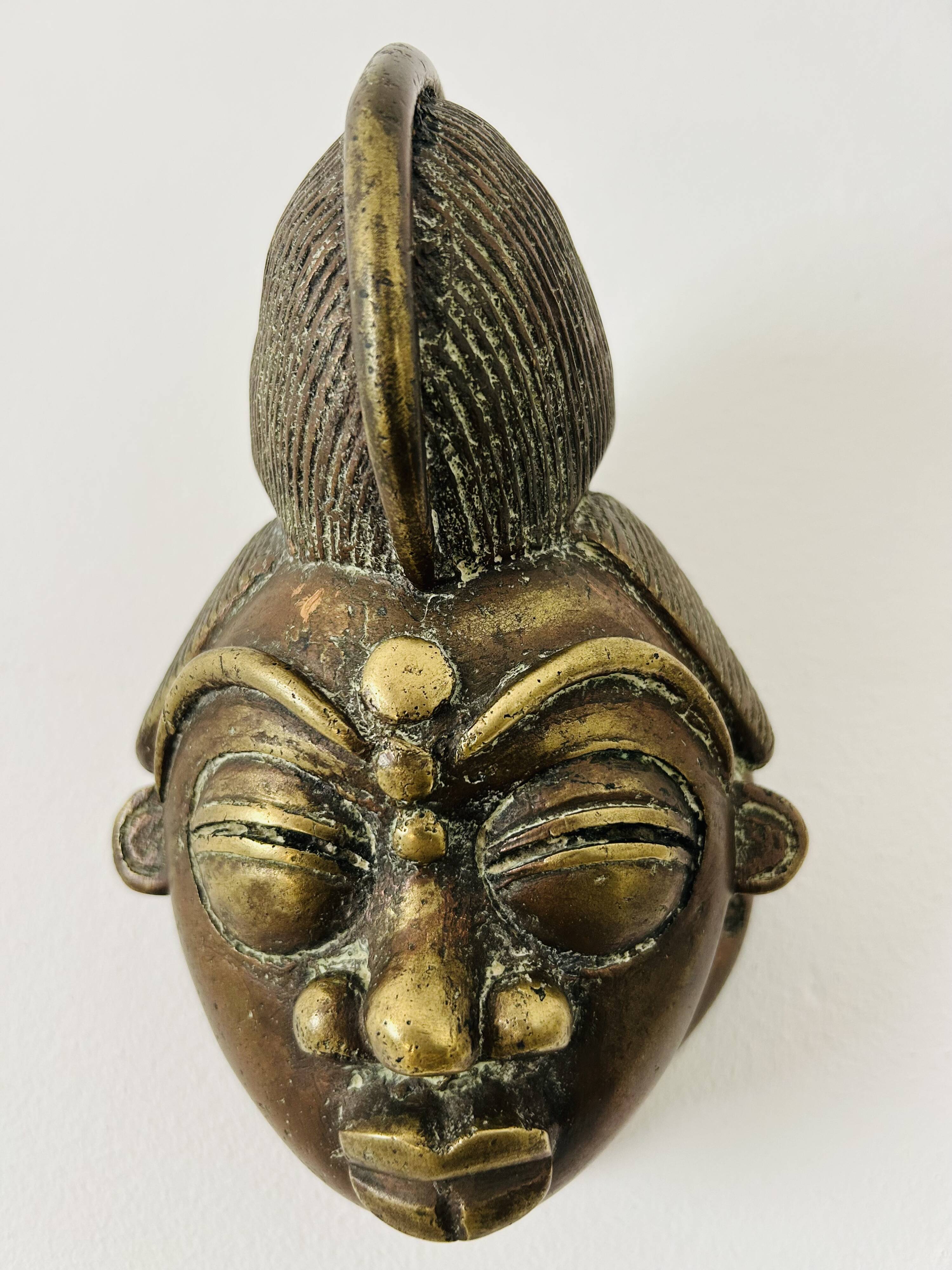 Masque en bronze africain, 19e siècle