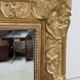 Miroir en bois doré, style régence, fin XlXe