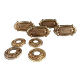 Gold door knobs and rosettes