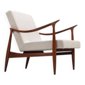 Sculptural Danish lounge chair in teak and fabric Denmark 1960