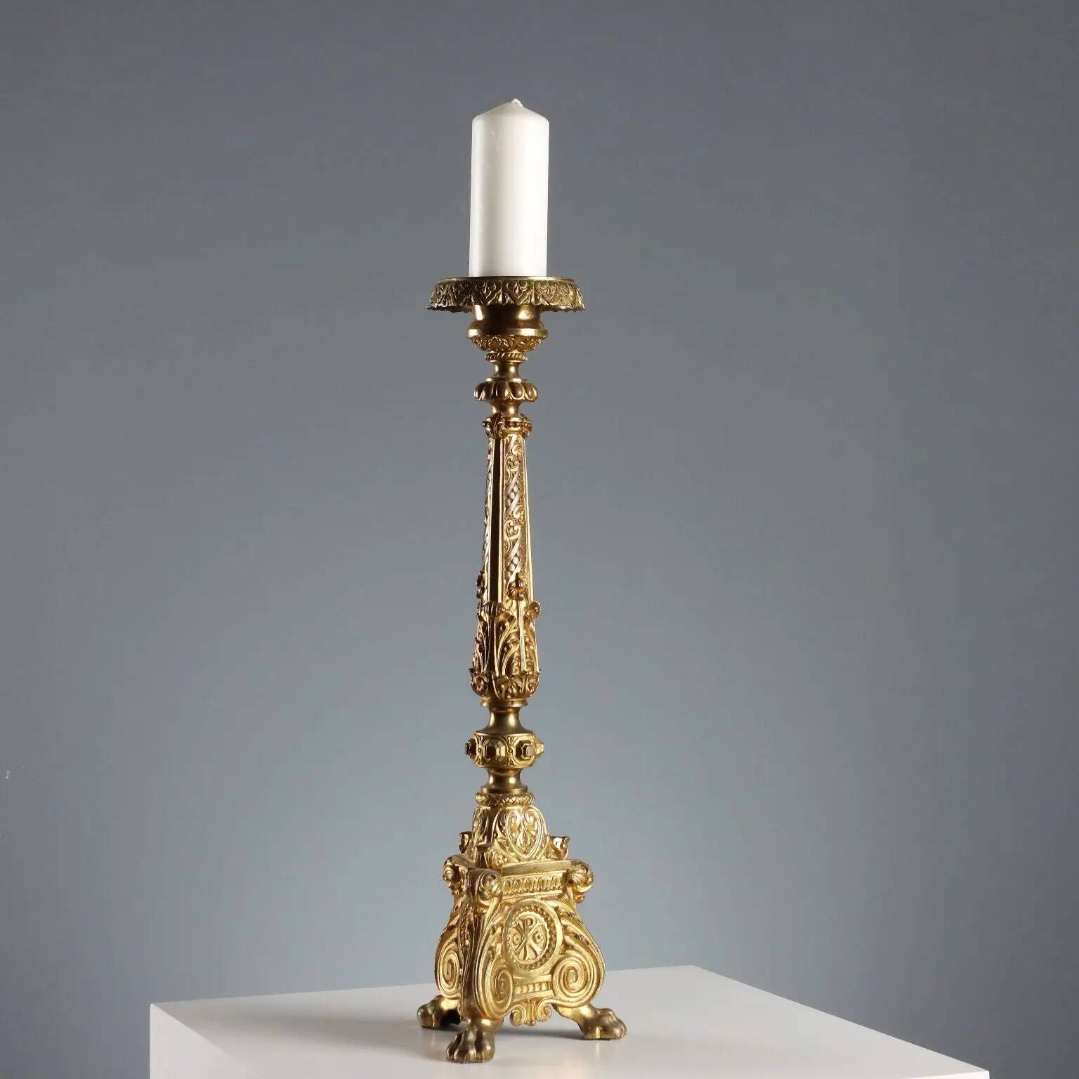 Antique gilded bronze candelabrum, 19th-century decorations.