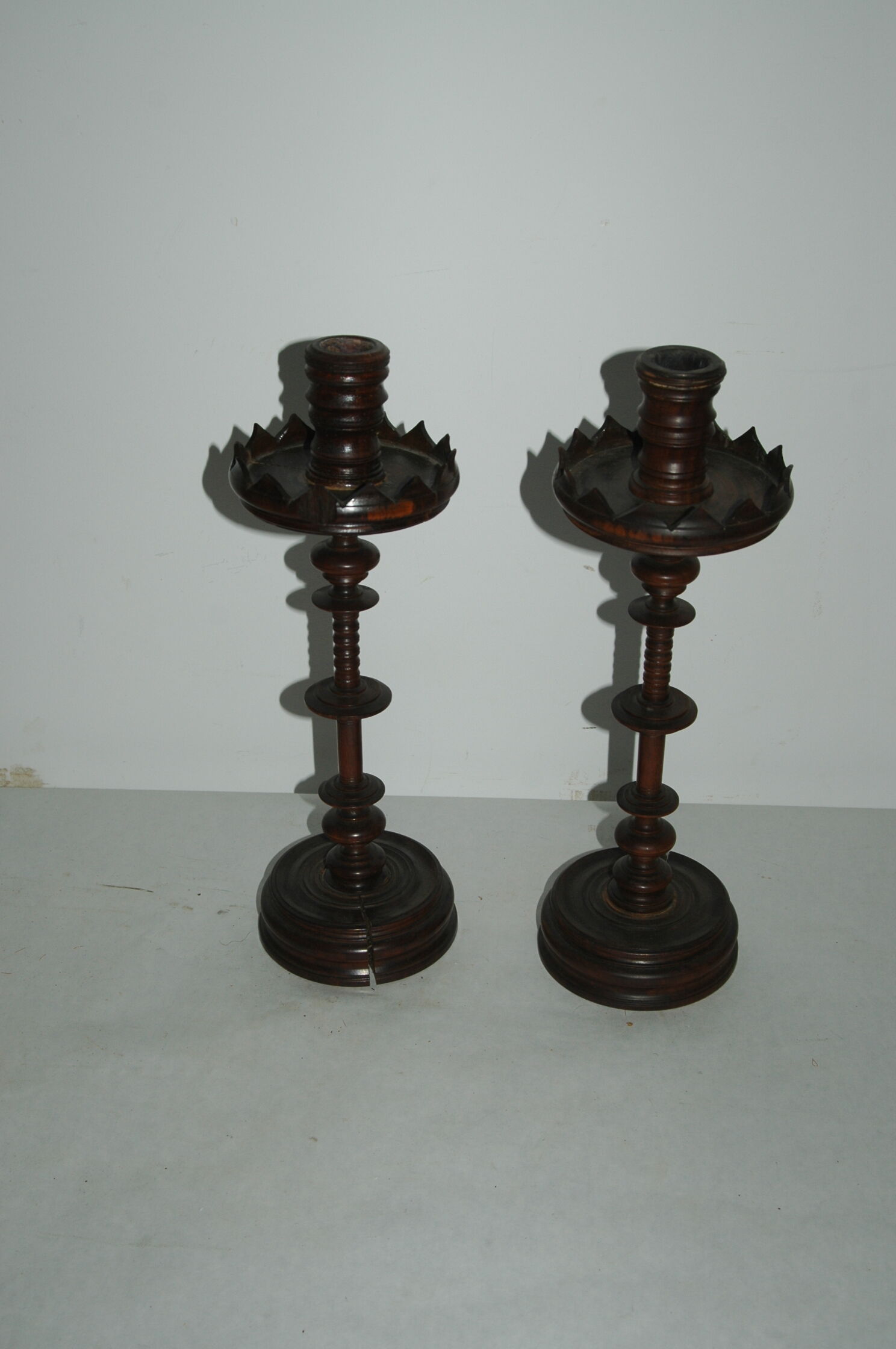 Pair of mahogany turned wood candlesticks