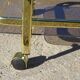 Golden metal and smoked glass dessert table