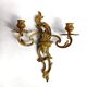 Pair of Rococo wall sconces in gilded bronze, Hollywood Regency, from the years.