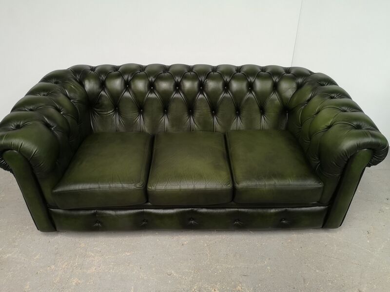 Three-seater green leather Chesterfield sofa