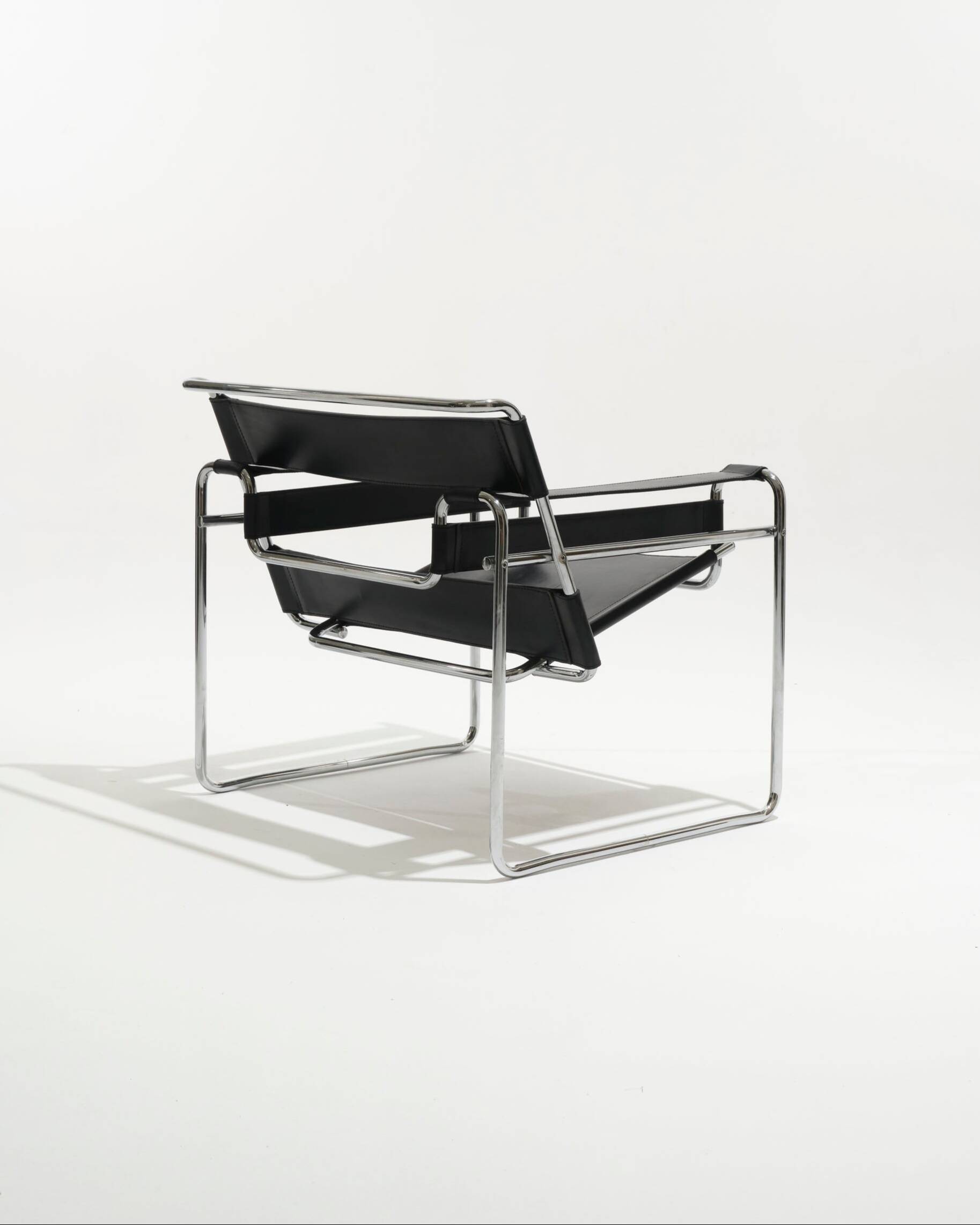 Wassily armchair in black leather, marcel breuer, 2000s
