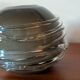 Smoky glass spherical vase with spiral applications from the 1970s.