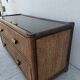 Vintage rattan and glass TV unit.