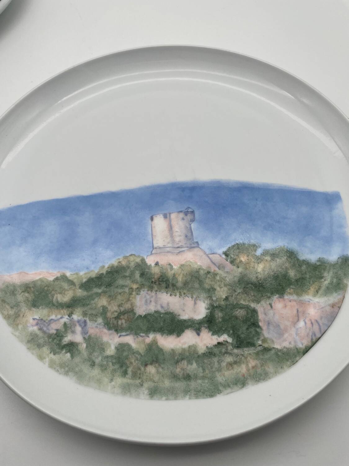 Hand painted porcelain plate with landscape decoration