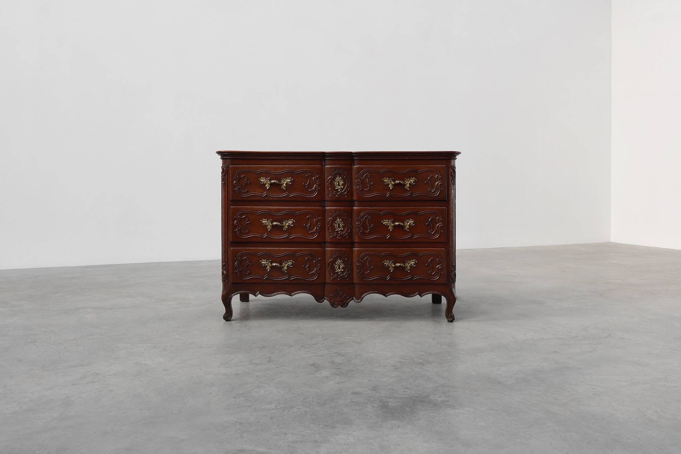 French 18th Century hand crafted oak chest of drawers in Louis XV style