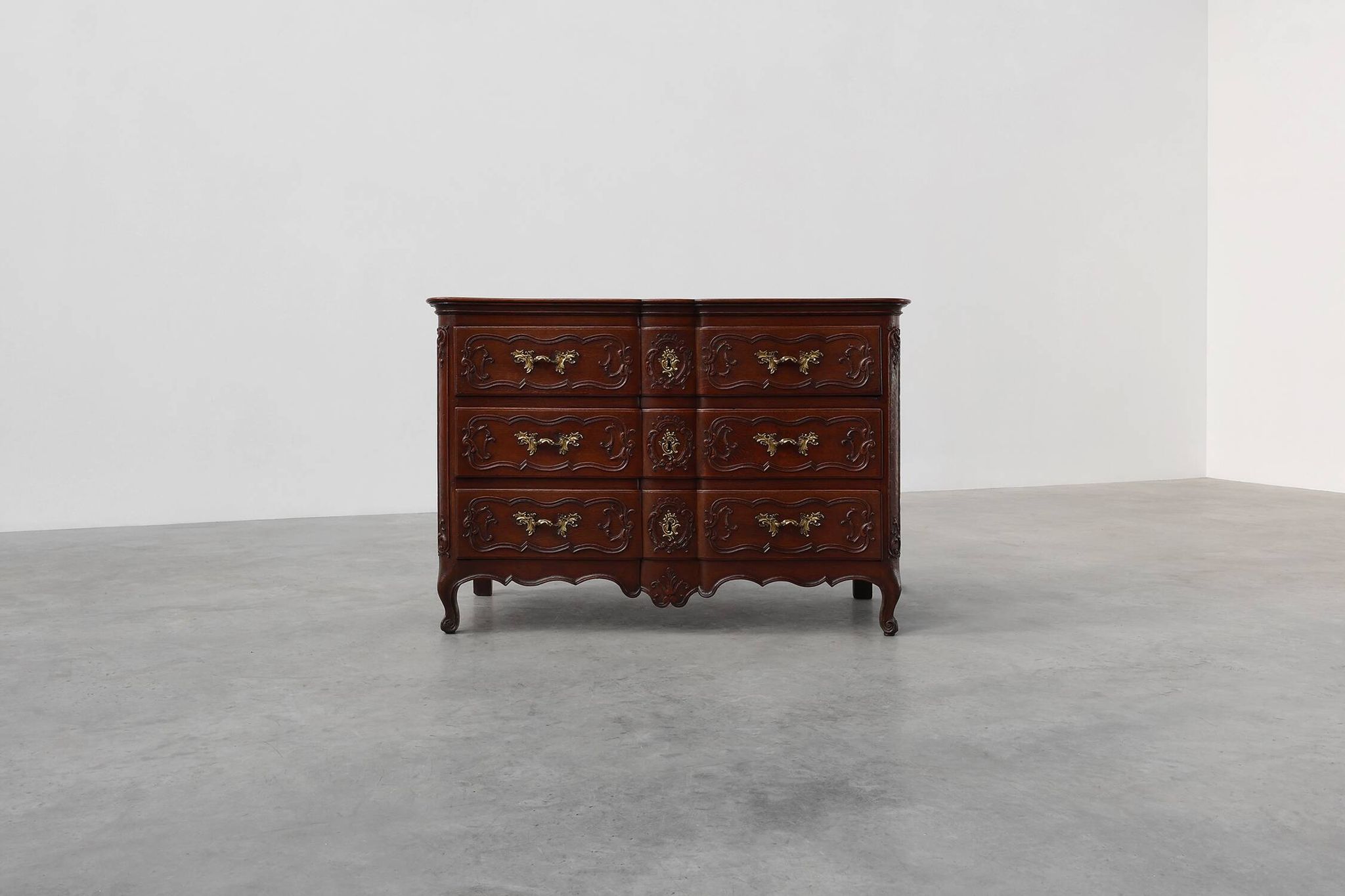 French 18th Century hand crafted oak chest of drawers in Louis XV style