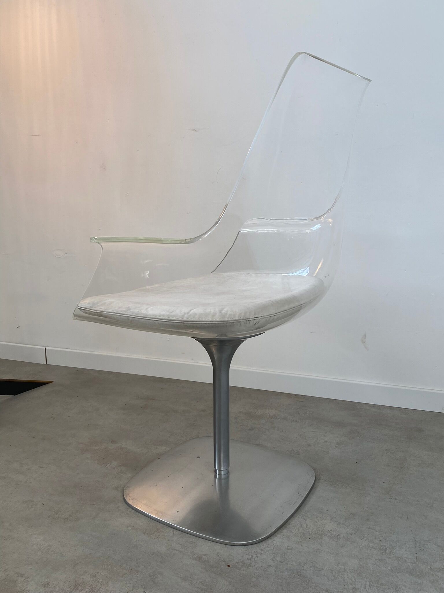 Old swivel desk chair plexiglass and steel design from the 70s