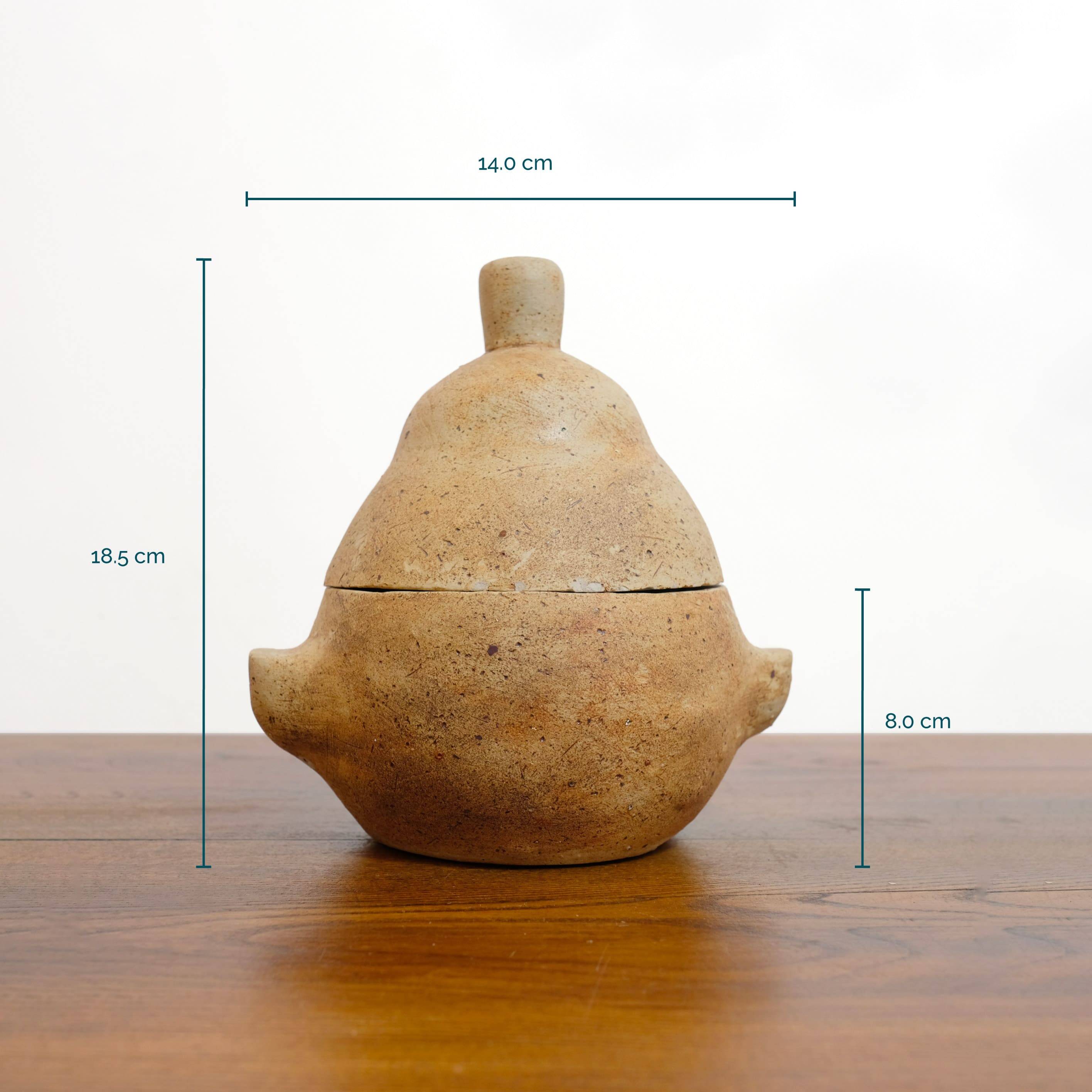 Pot couvert en grès en forme de poire.