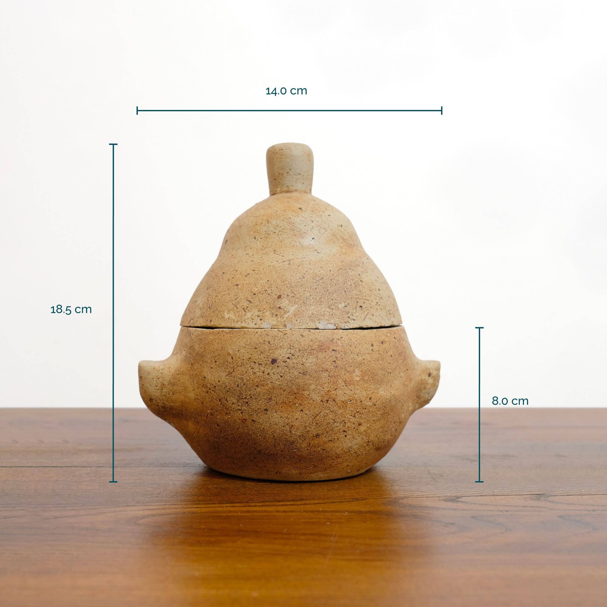 Pot couvert en grès en forme de poire.