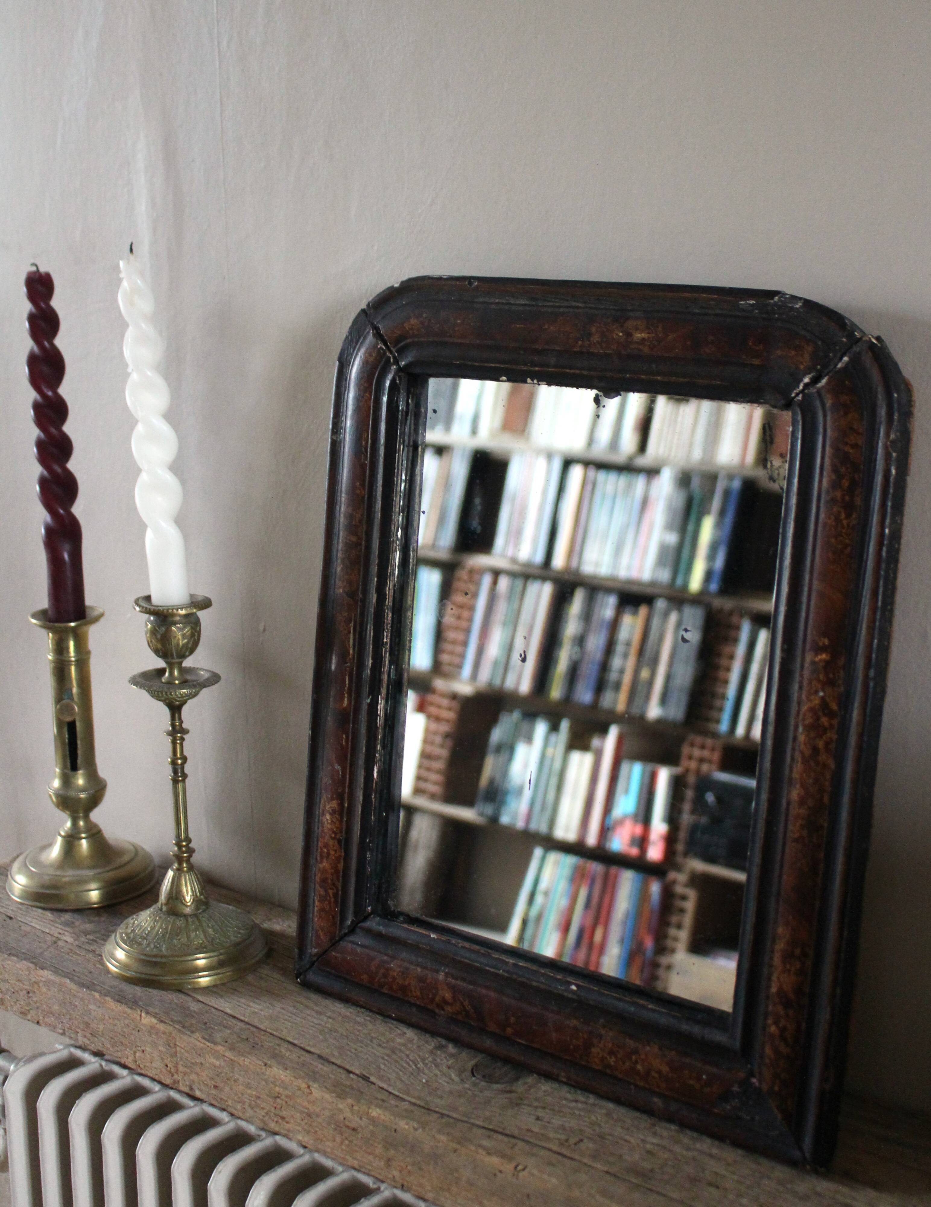 Antique Louis Philippe mirror in black and brown.