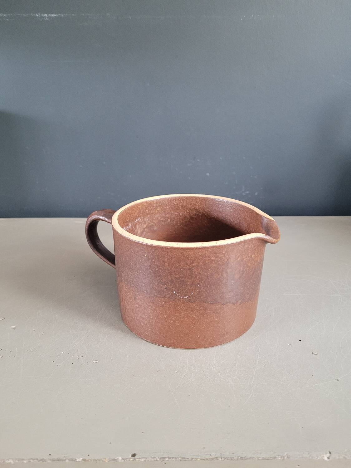 Pitcher - cream pot - in brown glazed earthenware