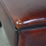 Large square sheepskin leather ottoman with a beautiful patina