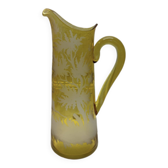 Decorated yellow glass pitcher