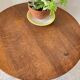 Vintage round oak coffee table with 2 shelves