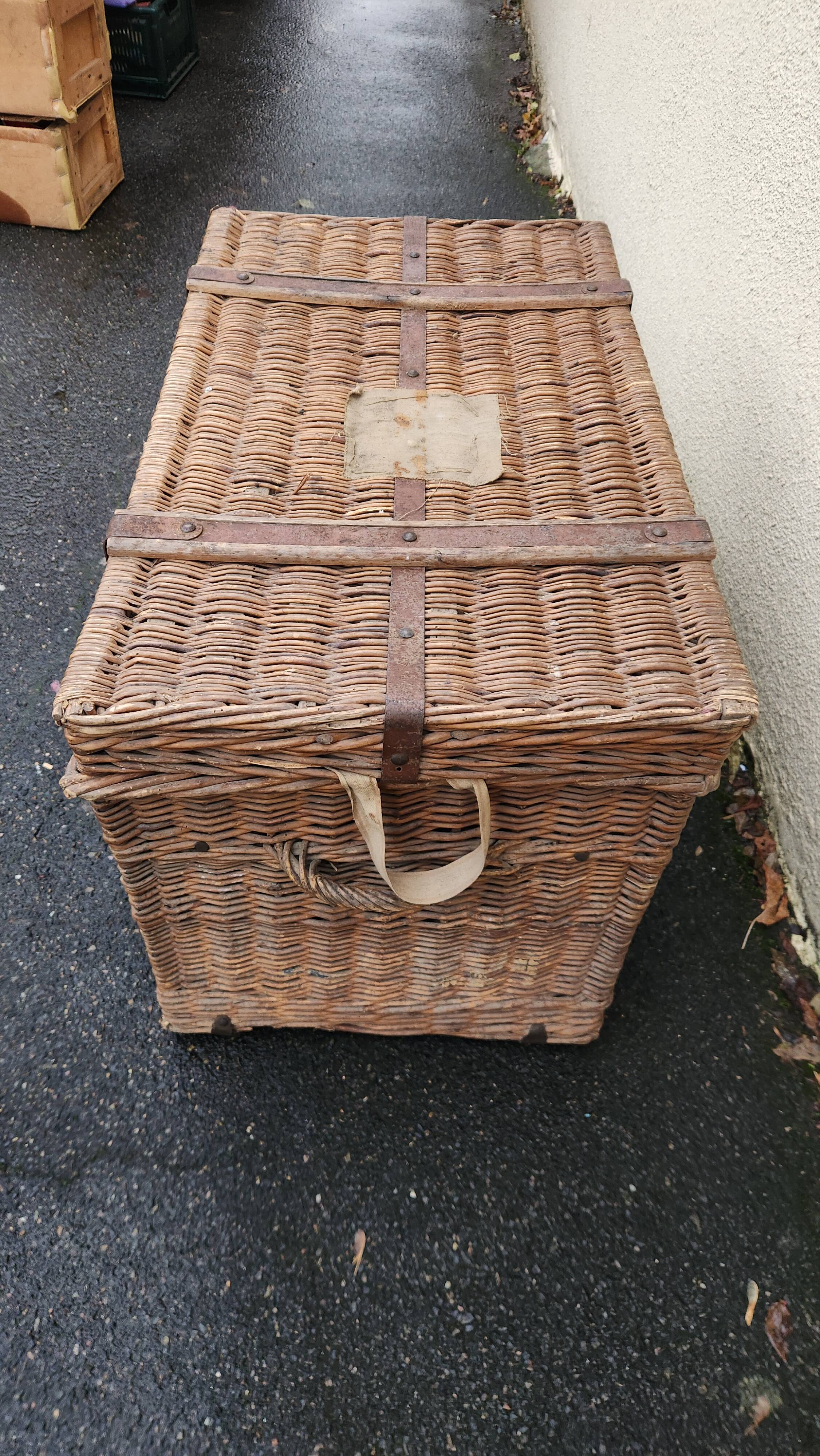 Antique vintage rattan and wicker travel trunk from the 1900s