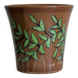 Cache-pot en céramique marron avec motif de feuillage vert peint à la main.