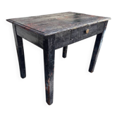Table de ferme artisanale en bois noir patiné