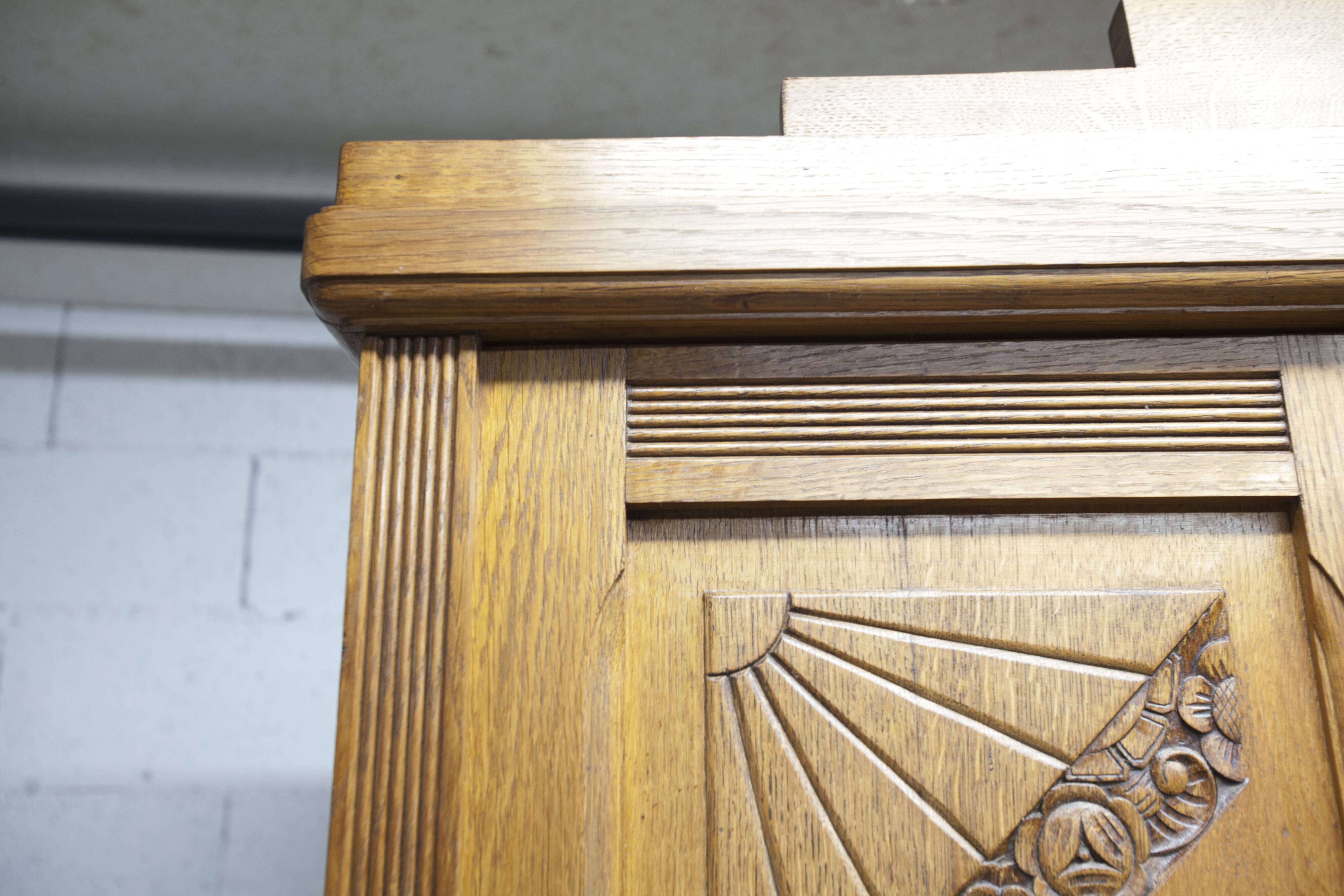 Art Deco carved oak wardrobe - Flemish workshop circa 1930