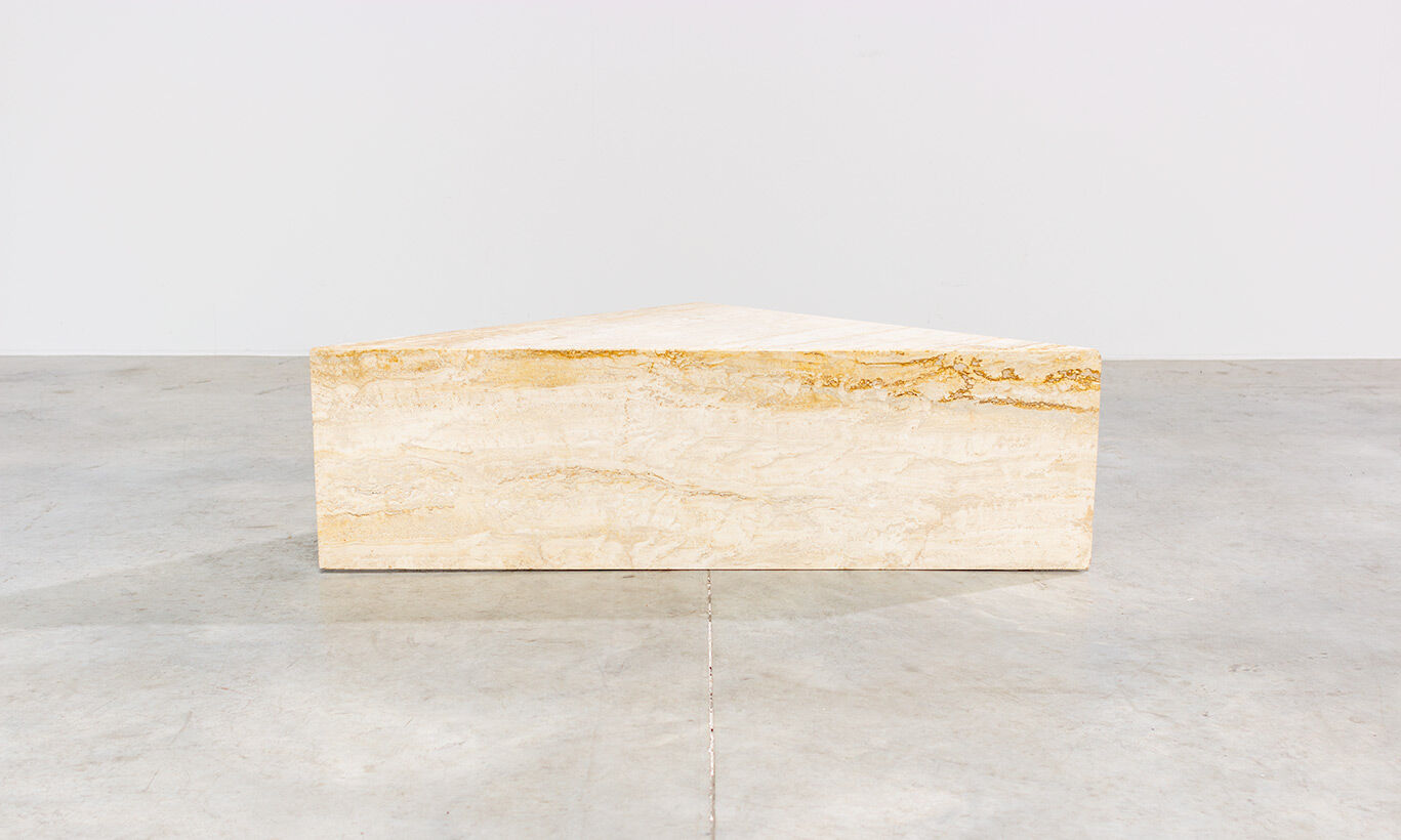 Triangular travertine lounge table around 1970 on the modernism