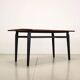 Vintage Italian table from the 1960s in stained ebony wood, with a teak veneer top.
