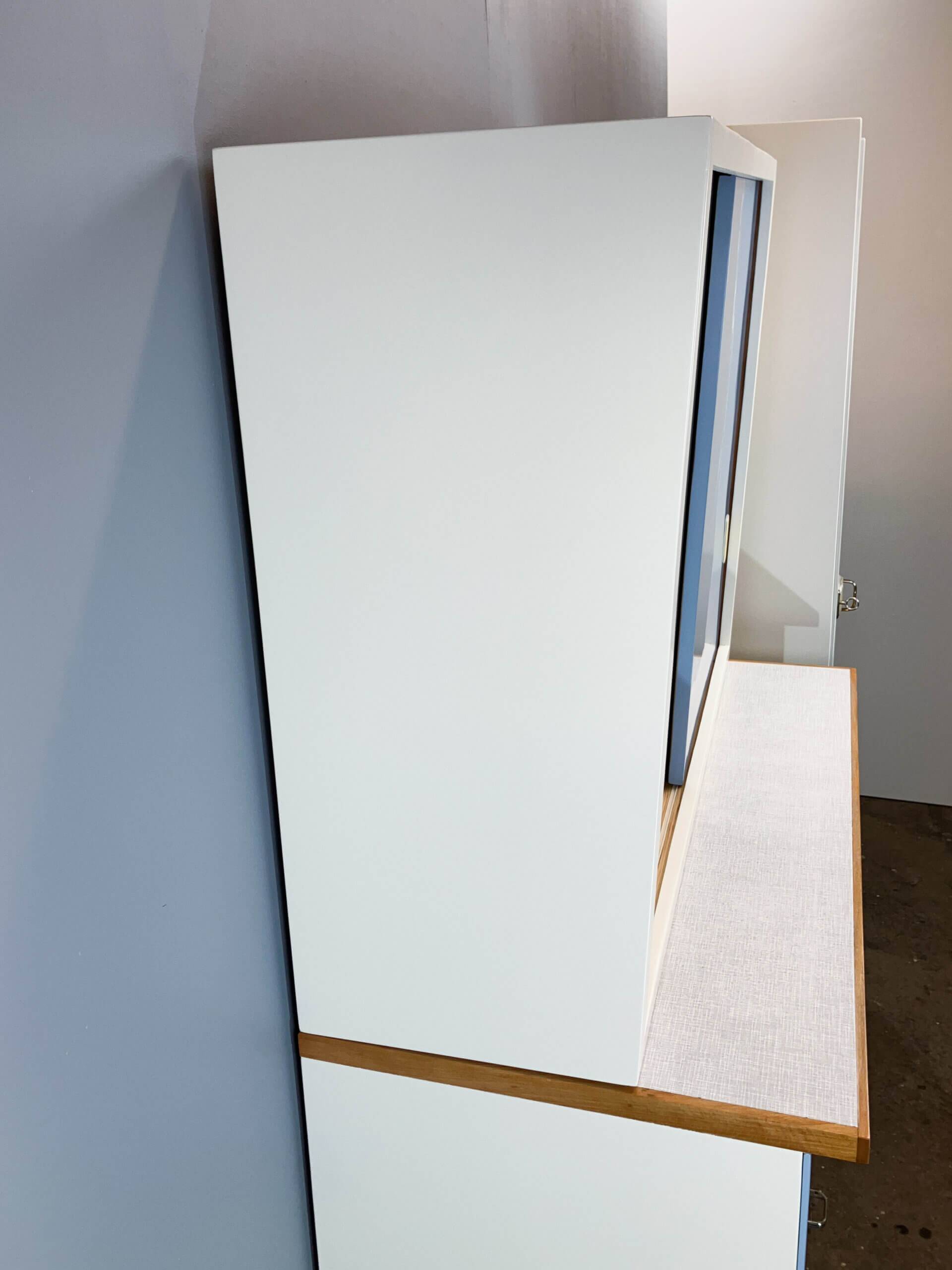 Kitchen cabinets, pastel blue and light gray, vintage from the 60s
