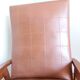 Scandinavian brown skai and wood armchair