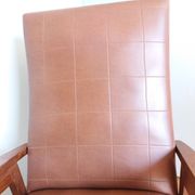 Scandinavian brown skai and wood armchair