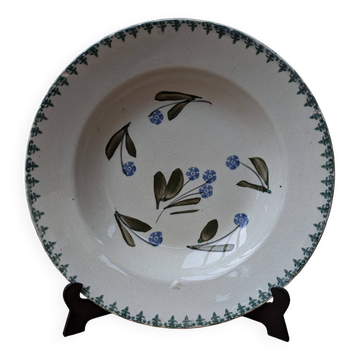 Old deep iron earth plate with blue flower pattern