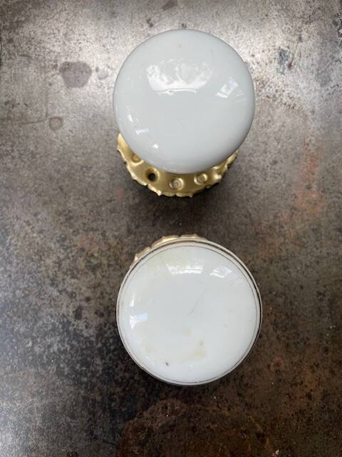 pair of round porcelain and copper Art Deco handles