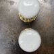 pair of round porcelain and copper Art Deco handles