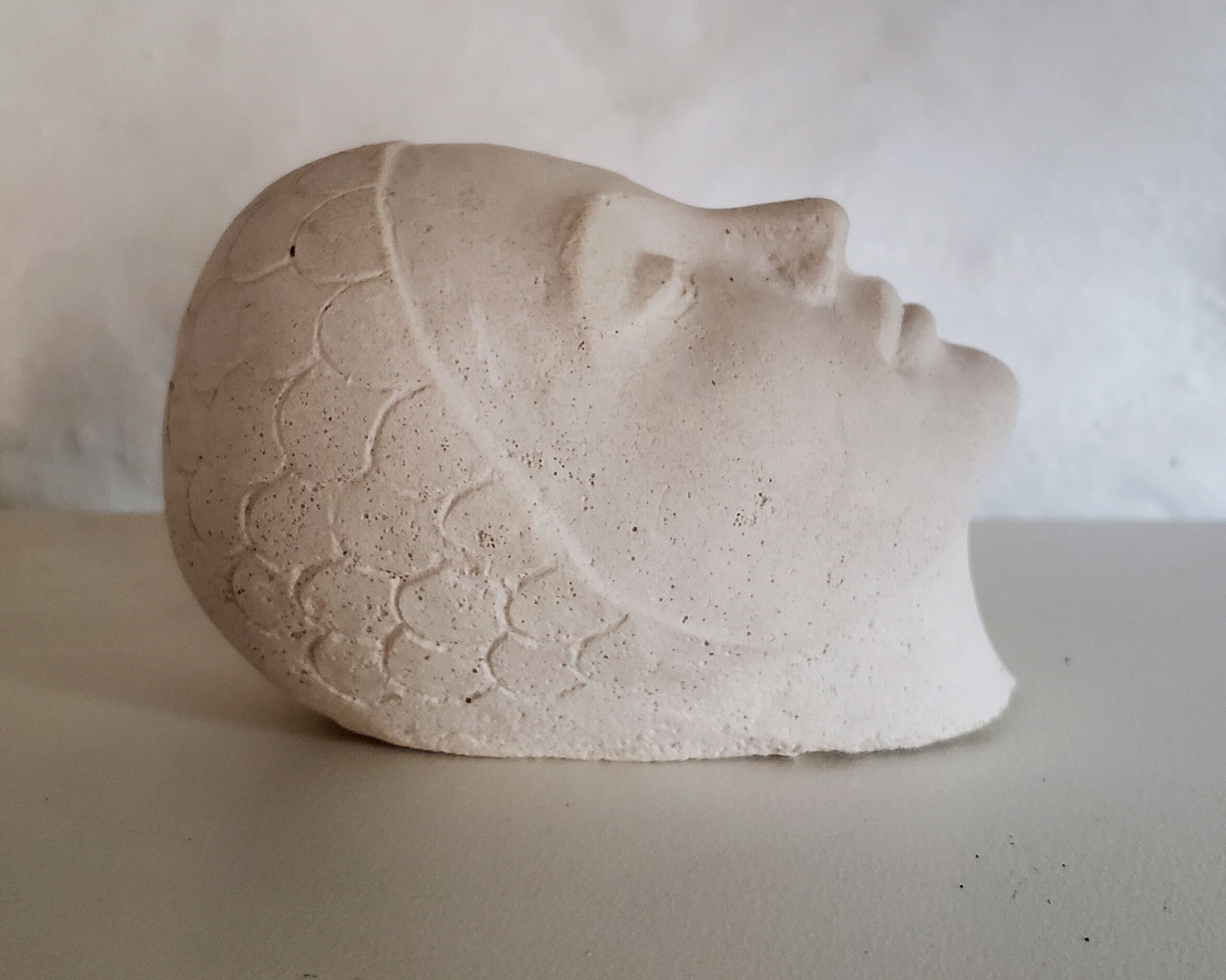 Plaster art-deco woman's head