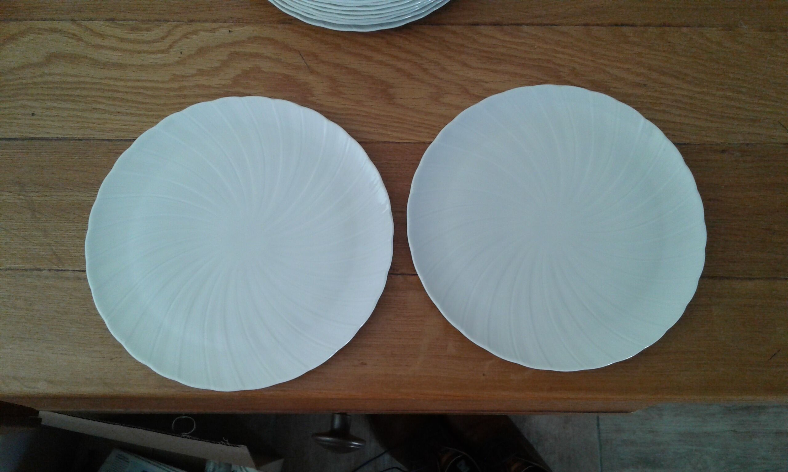 13 Plates . porcelain limoges.  B and Co. 20 cm diameter