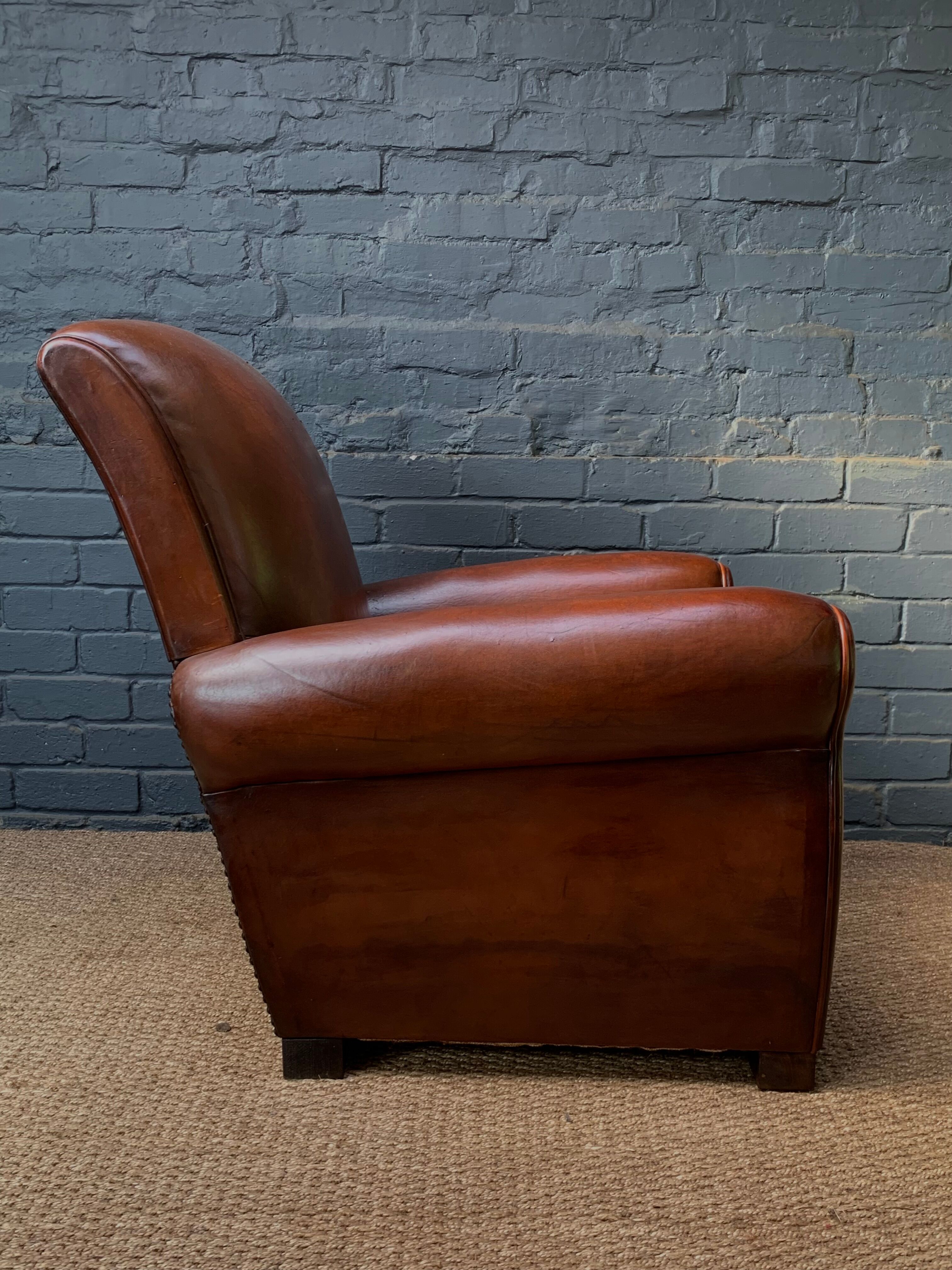 French, leather club chair, havana lounge model circa 1950's
