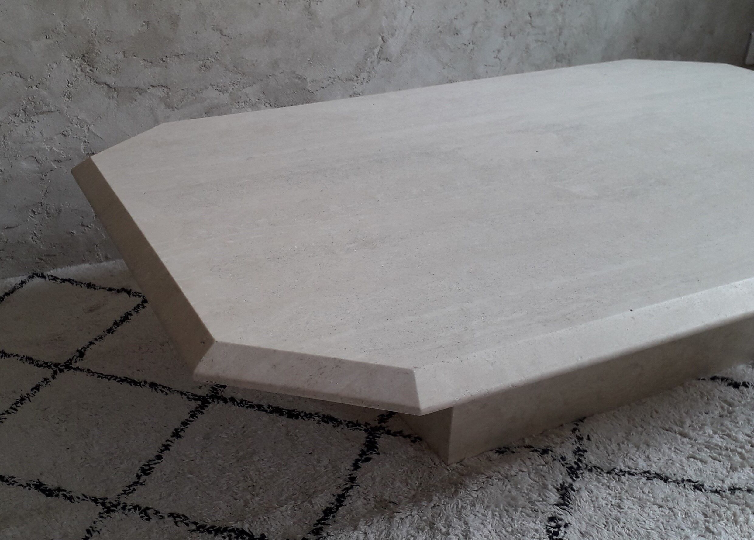 Coffee table in travertine