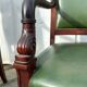 Paire de fauteuils de style Empire en acajou et cuir vert