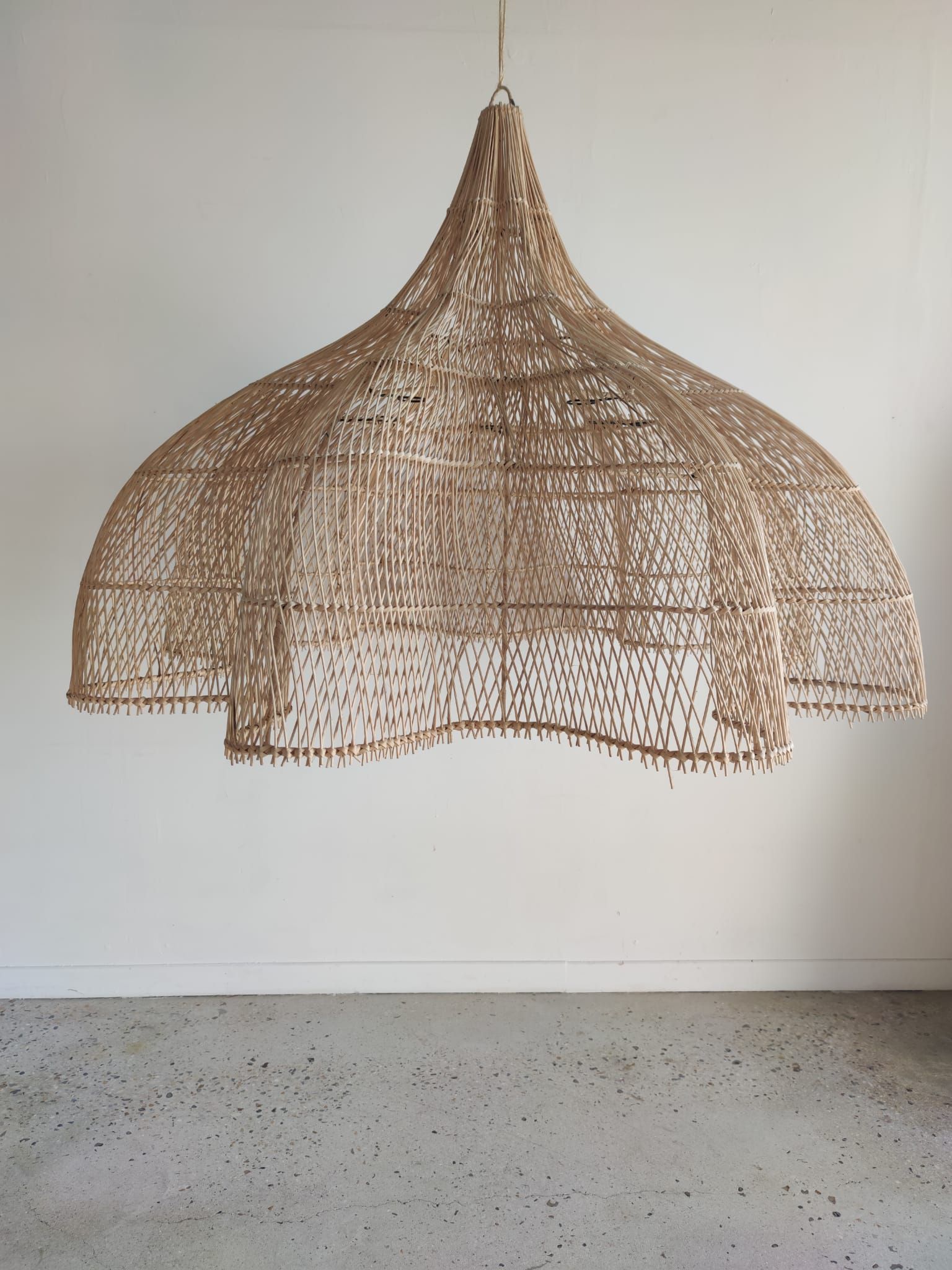 Huge rattan suspension in the shape of a corolla H:1m; D: 1m50