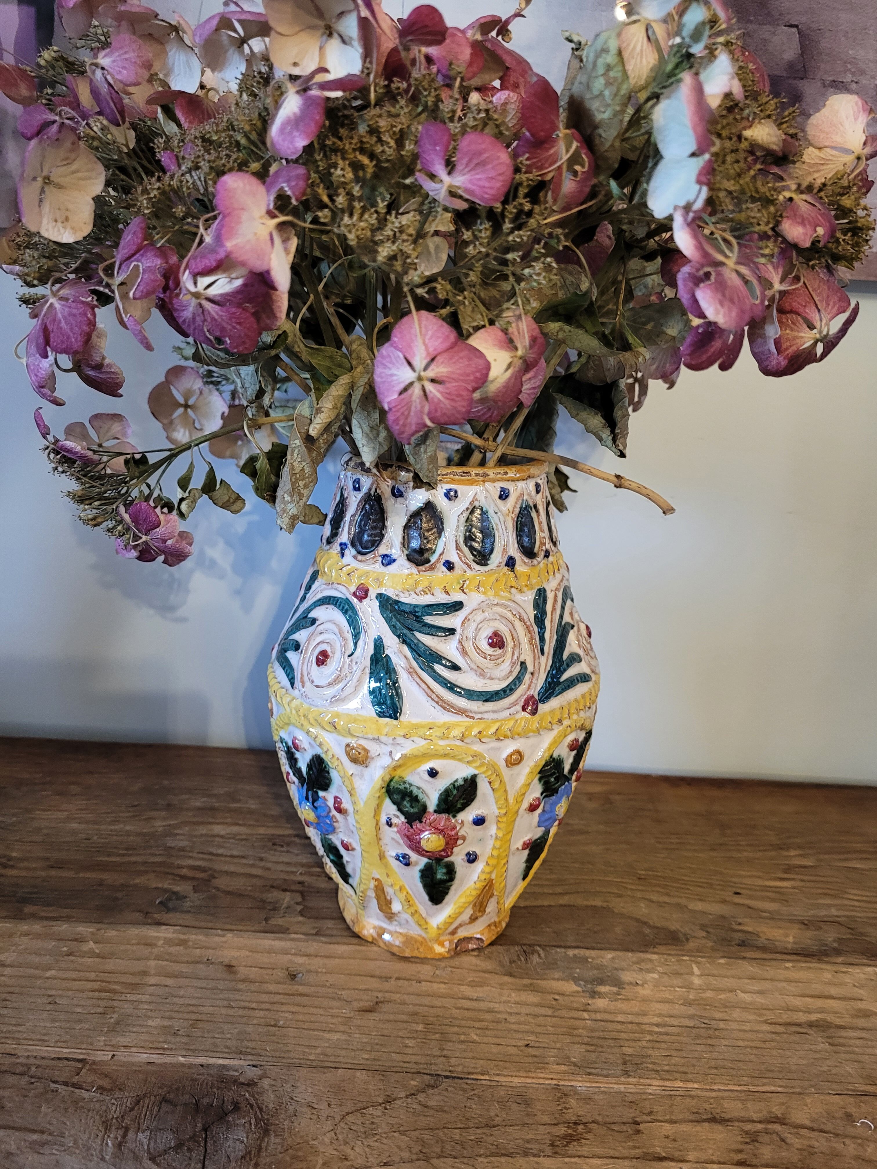 Hand-carved and hand-painted vase