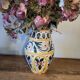Hand-carved and hand-painted vase