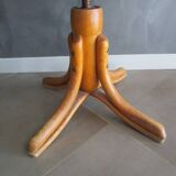 Old swivel office armchair in curved wood